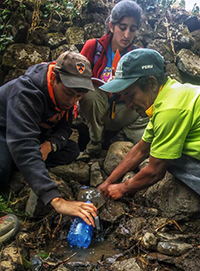 Kasturi Shah, center, participated in Engineers Without Borders, which receives support through the Keller Center. As part of the program, Shah traveled to Pitajaya, Peru, to help install a system to bring clean water to the remote town. (Photo courtesy of Kasturi Shah, Class of 2016)